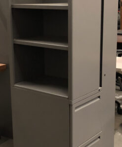 gray storage unit with three shelves and and two cabinets on the right side
