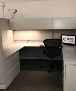 monolithic white steel workstation with black chair