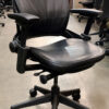 high back black office chair with knob to adjust height