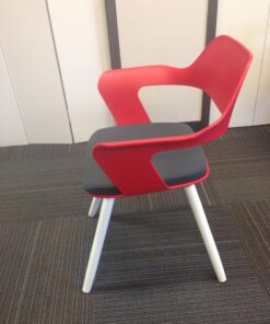 red lobby chair with arms and fabric seat